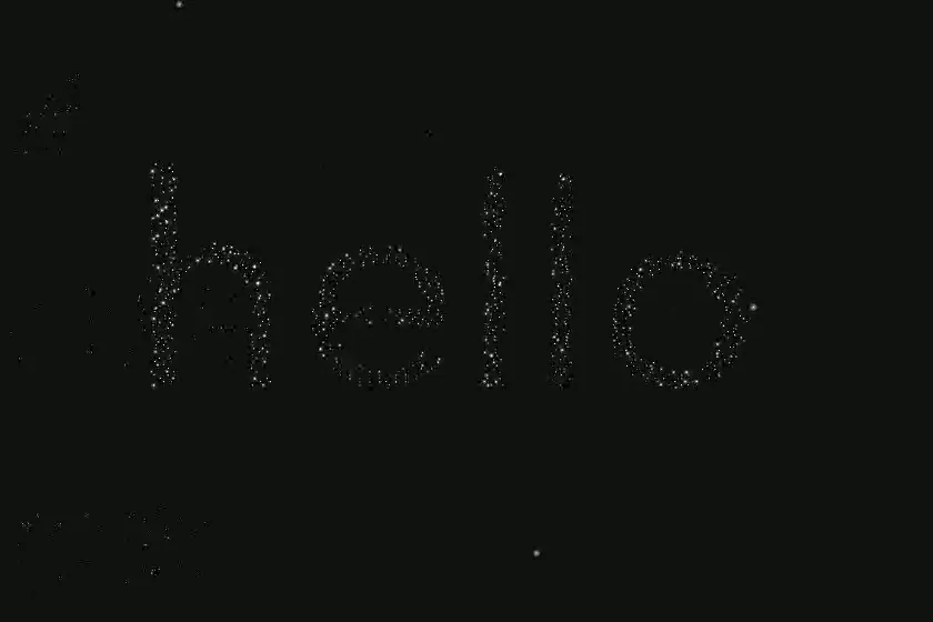 The word hello formed out of faint drifting particles against a dark sky